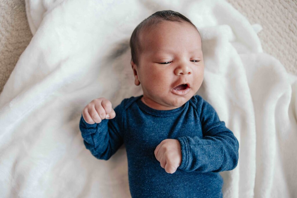 Baby with mouth open in Elmhurst, IL by Taylor Lynn Studios