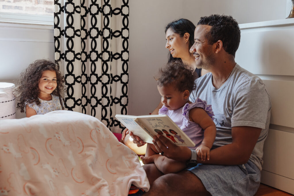 A family enjoying an in-home winter photo session.